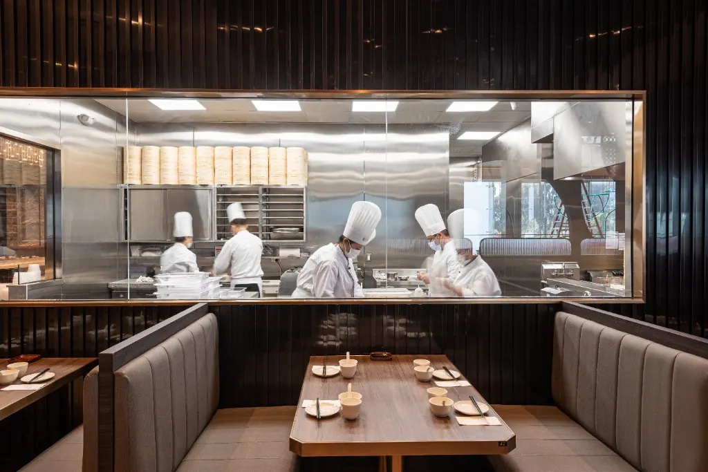 A set booth facing the open kitchen